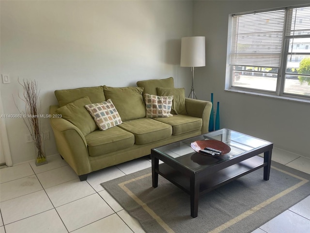 living room featuring light tile floors