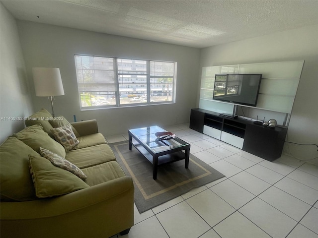 tiled living room with a textured ceiling