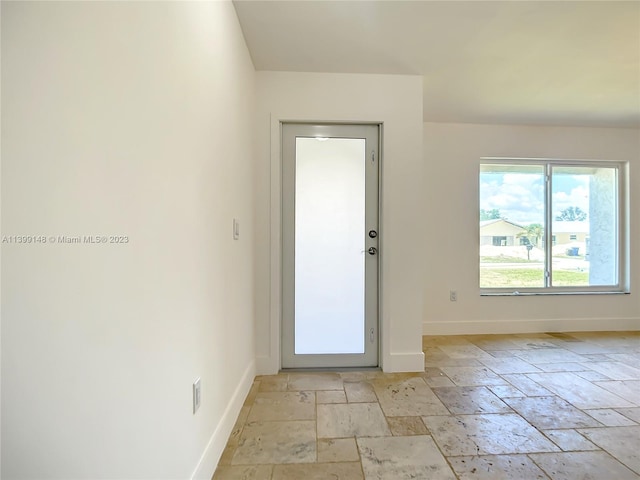 entryway with light tile floors