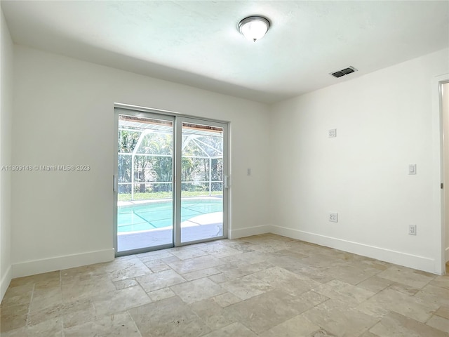 view of tiled spare room