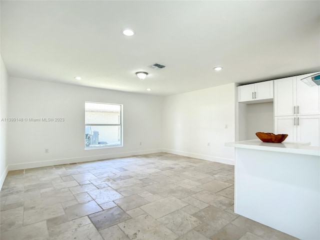 view of tiled spare room