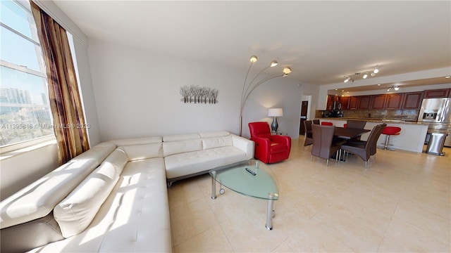 tiled living room with track lighting