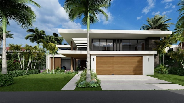 contemporary house featuring a front lawn and a garage