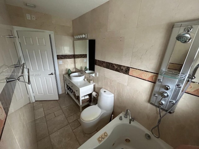 bathroom featuring tile walls, toilet, vanity, tile floors, and a bath