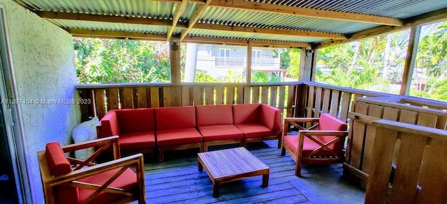 deck with an outdoor hangout area