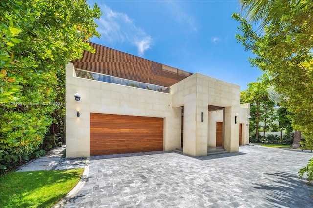 modern home featuring a garage