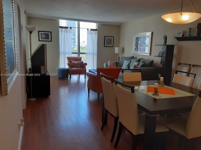 dining room featuring dark hardwood / wood-style flooring