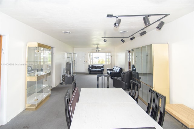 dining room featuring ceiling fan and track lighting