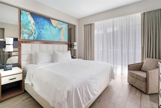 bedroom featuring light hardwood / wood-style flooring