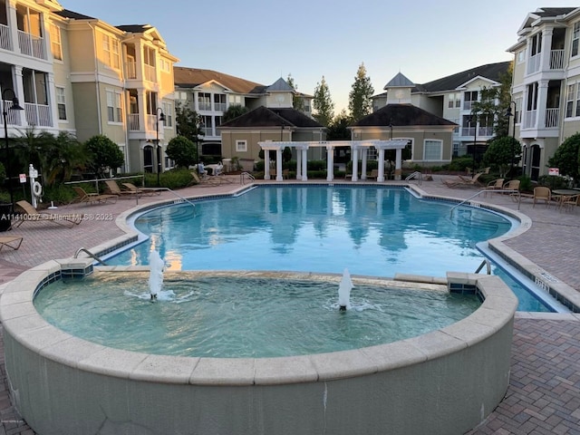 view of pool featuring pool water feature