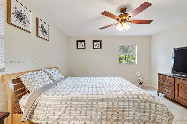 bedroom with light tile patterned floors and ceiling fan