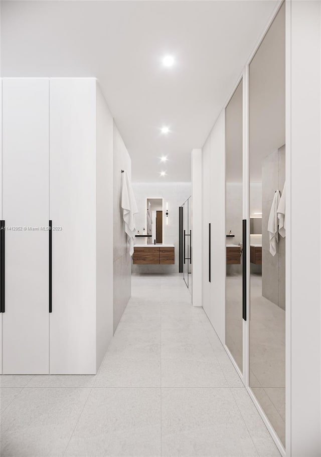 hallway with light tile flooring