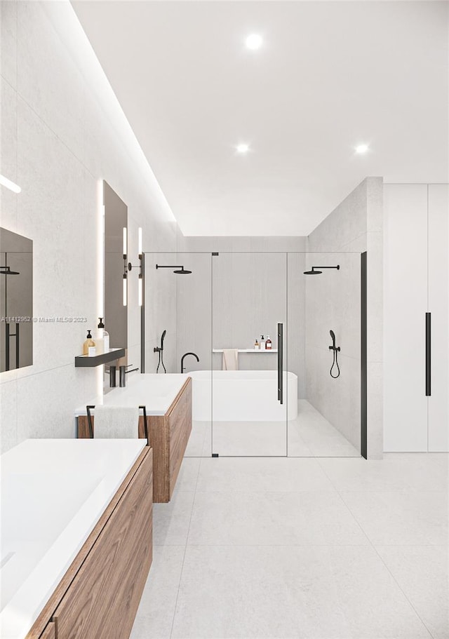 bathroom featuring tile walls, tile floors, and independent shower and bath