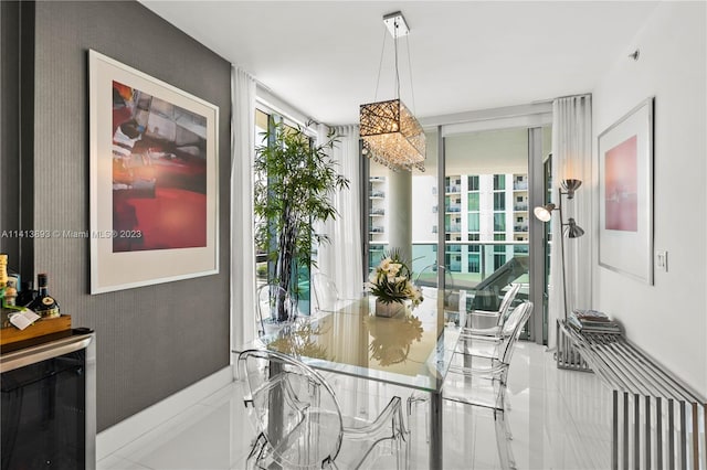 dining area with tile flooring