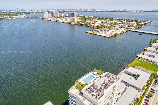 birds eye view of property featuring a water view