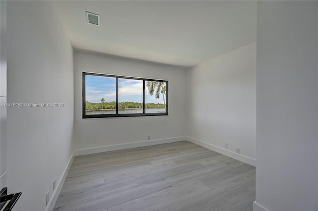 empty room featuring light hardwood / wood-style floors