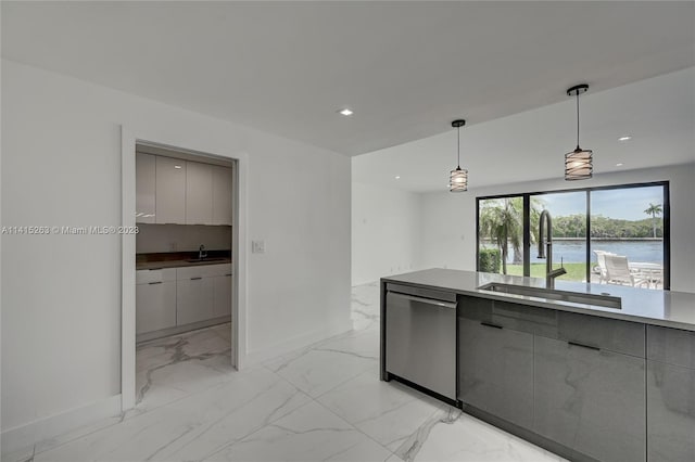 kitchen with a water view, hanging light fixtures, stainless steel dishwasher, sink, and light tile floors