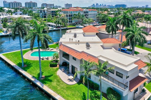 drone / aerial view with a water view