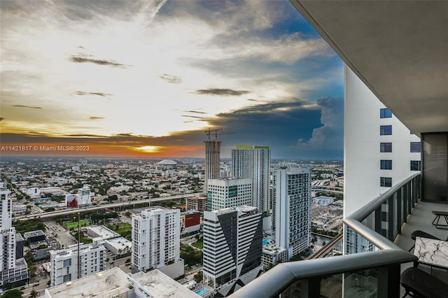 view of balcony at dusk