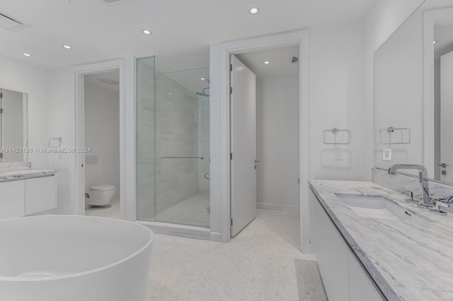 bathroom with tile patterned flooring, toilet, vanity, and an enclosed shower