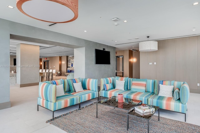 living room with light tile patterned floors