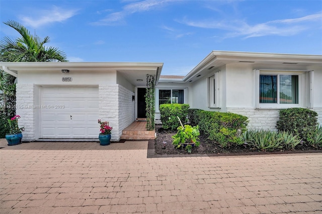 ranch-style house with a garage