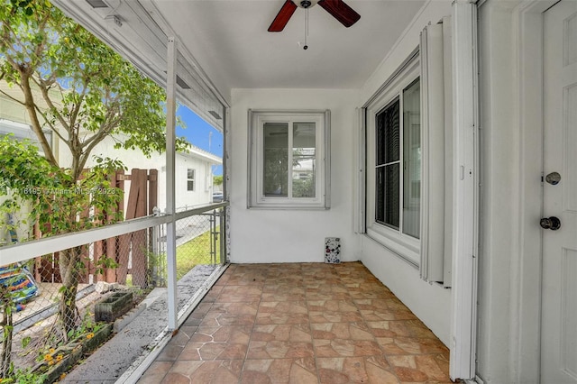 balcony featuring ceiling fan