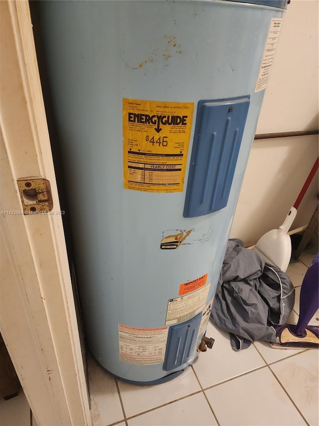 interior details with water heater and tile patterned floors