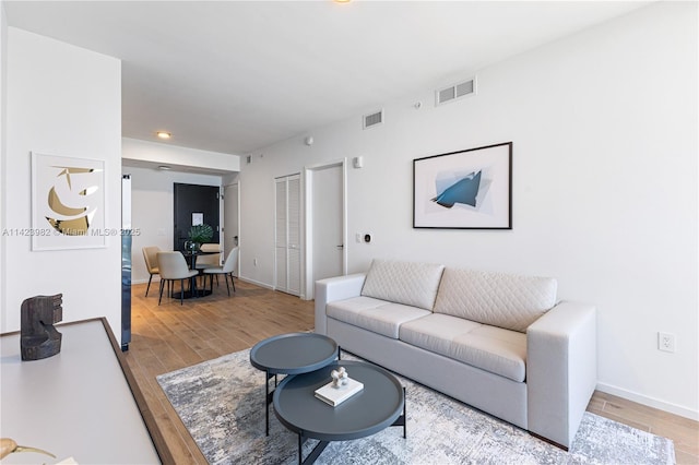 living room with light wood-type flooring