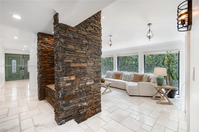 tiled living room with ornamental molding