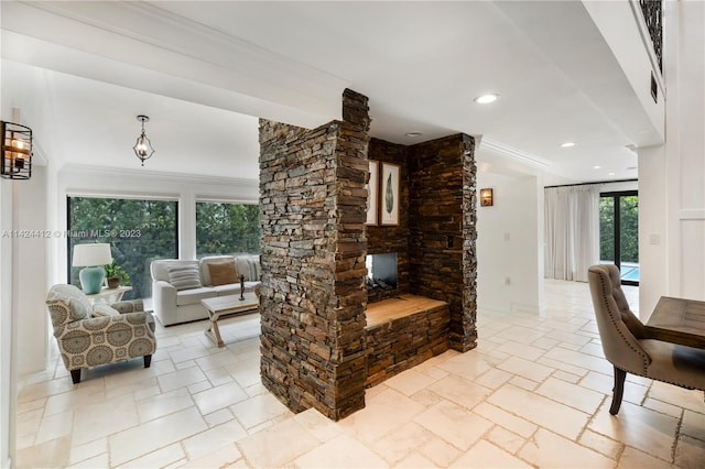 tiled living room featuring crown molding