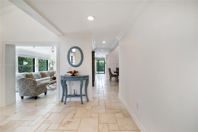 interior space featuring light tile patterned floors and crown molding