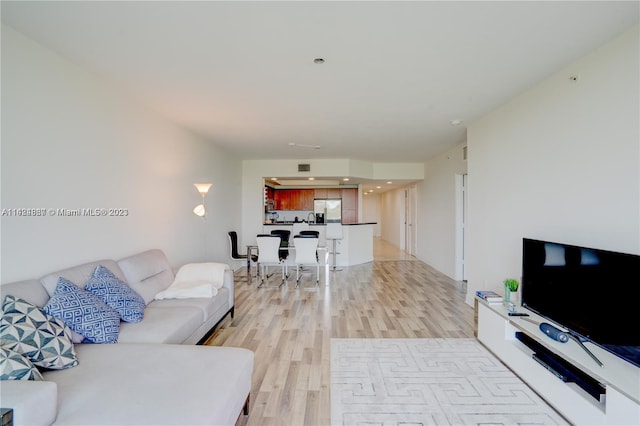 living room with light wood-type flooring