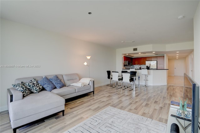 living room featuring light wood-type flooring