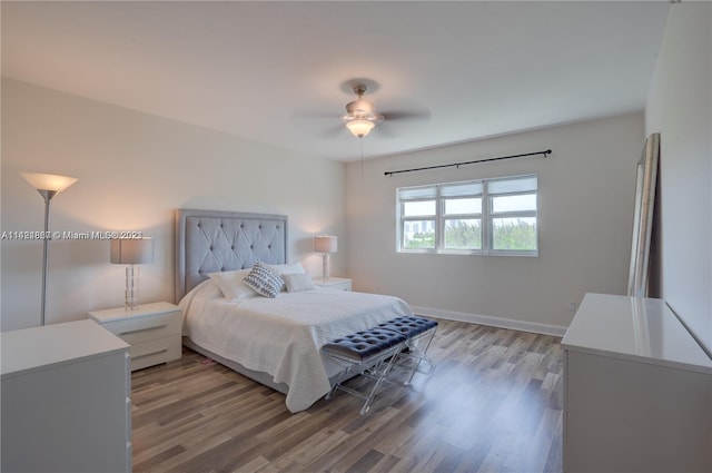 bedroom featuring ceiling fan and light hardwood / wood-style flooring