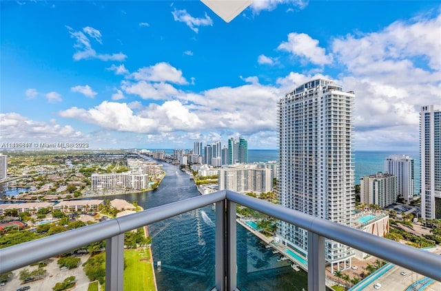 balcony featuring a water view