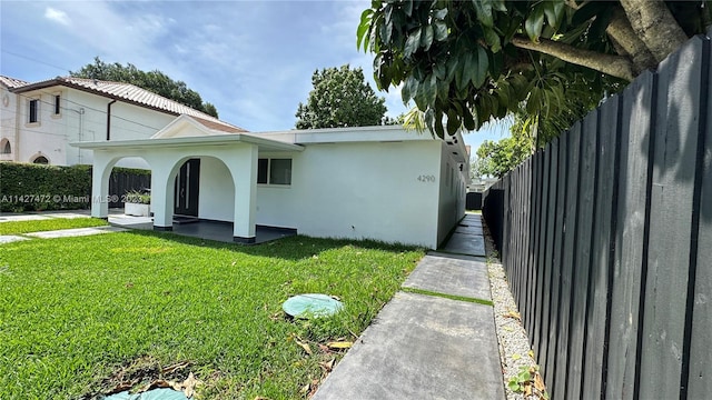 exterior space with a front lawn