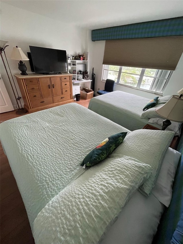 bedroom featuring hardwood / wood-style floors