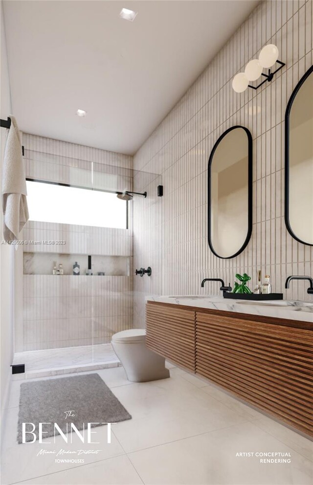 bathroom with tile walls, double vanity, toilet, and tile floors