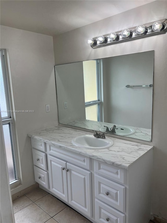 bathroom with vanity and tile patterned floors