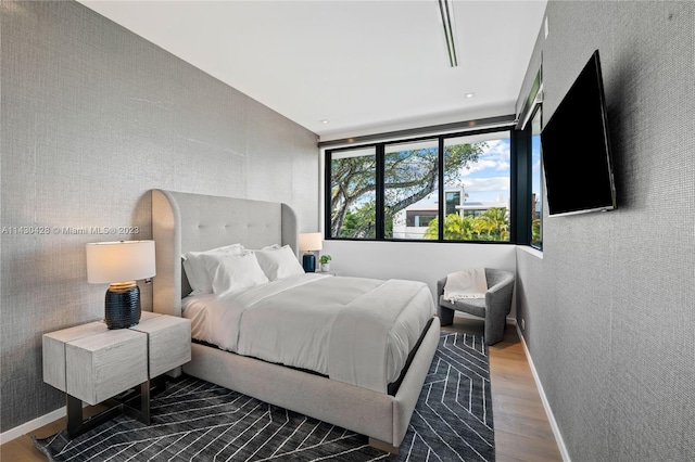 bedroom featuring hardwood / wood-style flooring