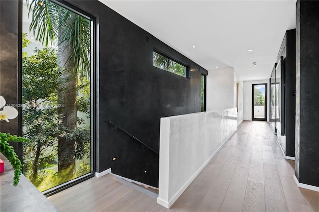 foyer entrance with a healthy amount of sunlight and light wood-type flooring