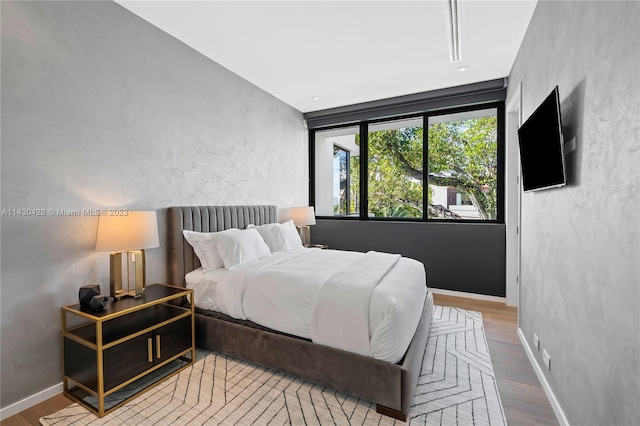 bedroom featuring hardwood / wood-style floors