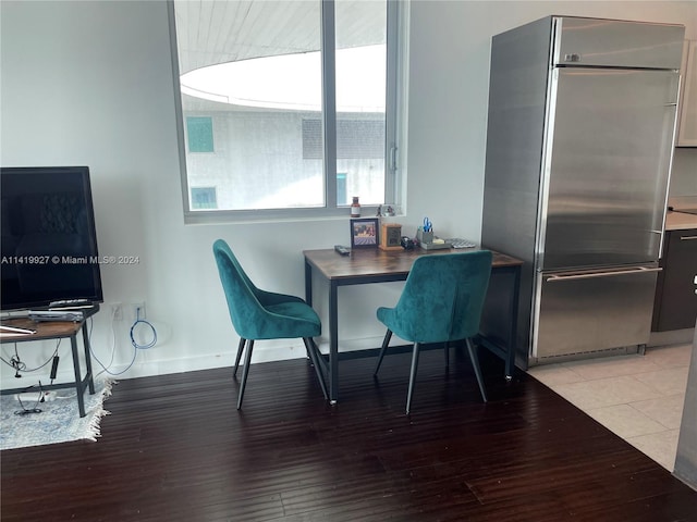 dining area featuring light wood-type flooring