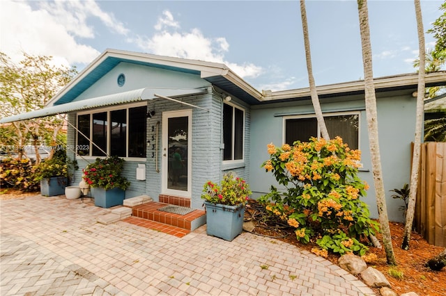2533 Fillmore St, Hollywood, FL 33020 - view of front facade featuring a patio
