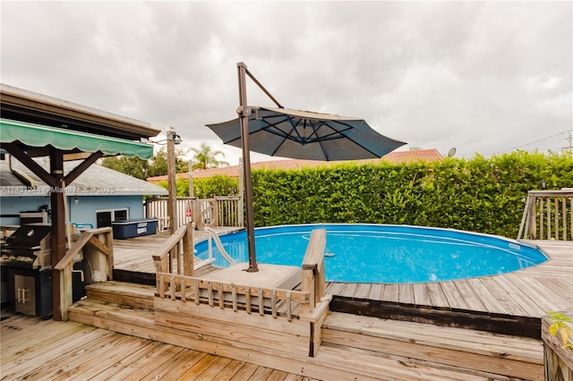 2533 Fillmore St, Hollywood, FL 33020 - view of swimming pool featuring a wooden deck