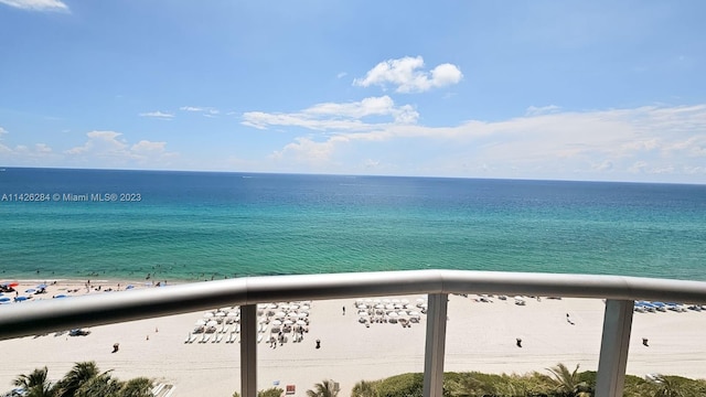 view of water feature with a beach view