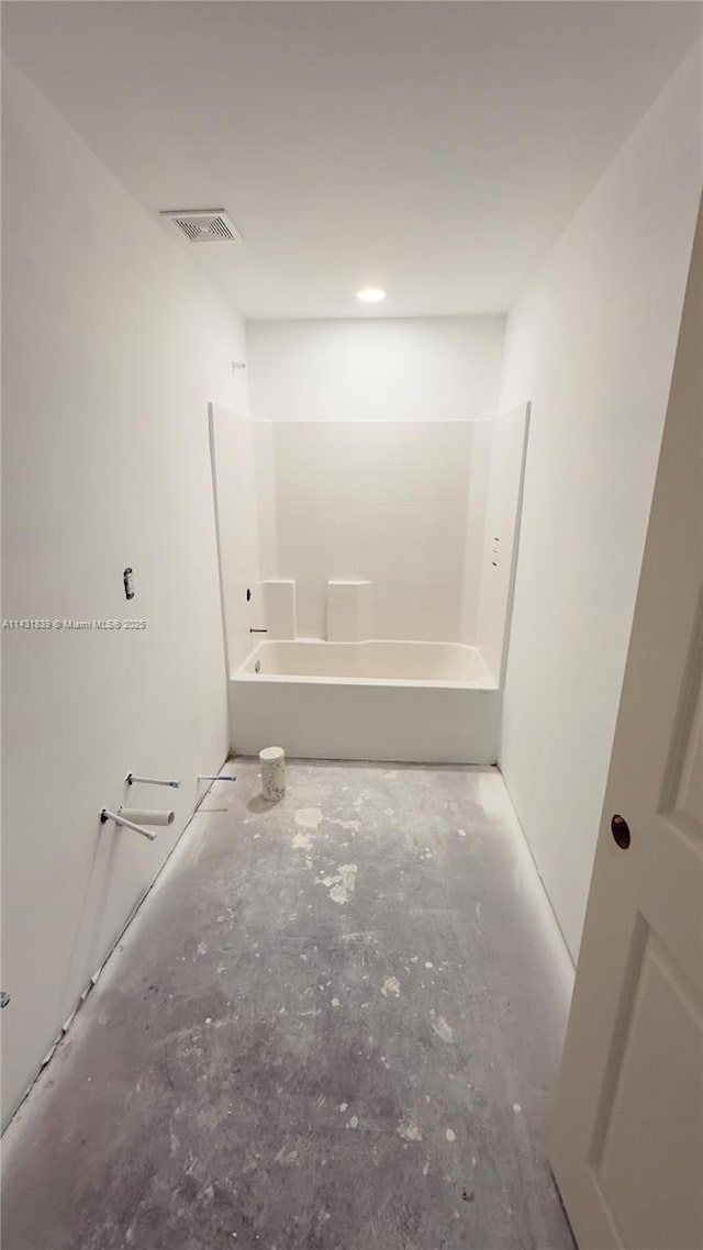 full bathroom featuring visible vents, unfinished concrete floors, and shower / bathtub combination