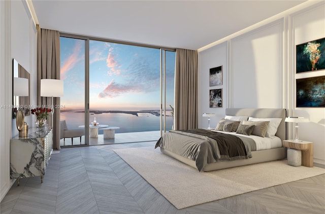 bedroom featuring parquet floors, access to exterior, a water view, and expansive windows