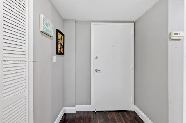 doorway to outside featuring dark hardwood / wood-style flooring